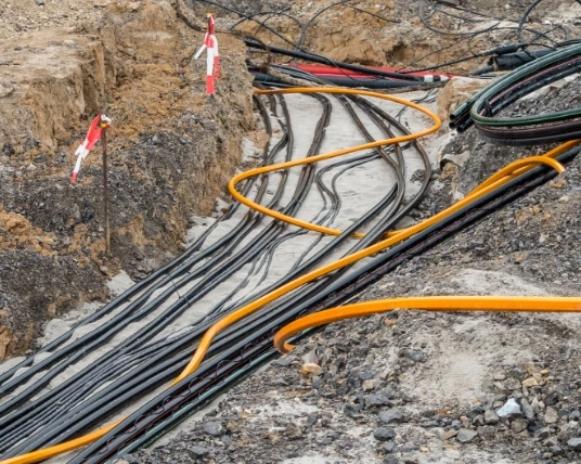 Underground power cables laid in a trench